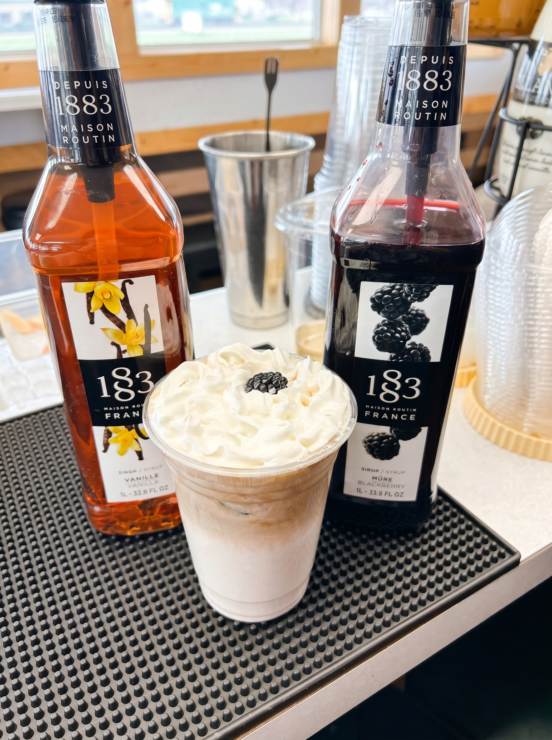 Blackberry vanilla iced latte with 1883 syrups